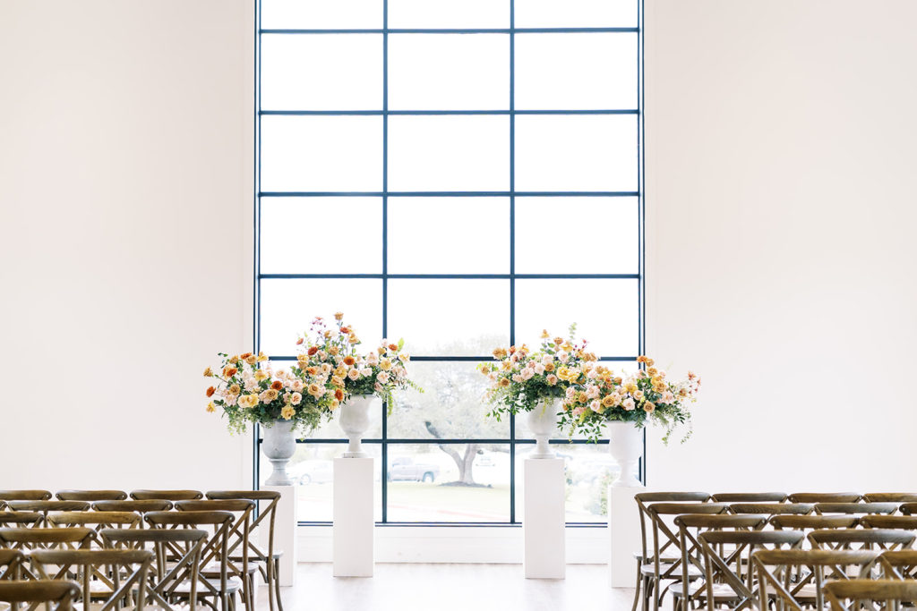 beautiful wedding ceremony with flowers at the altar 